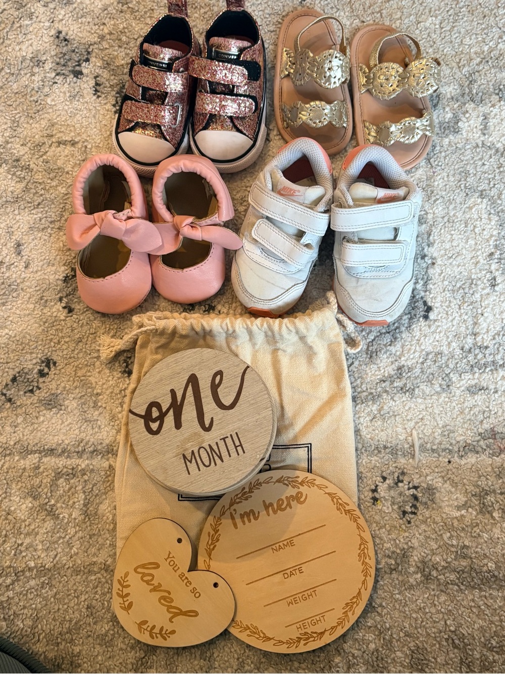 Adorable baby girl clothing and accessories ranging from newborn-12 months.